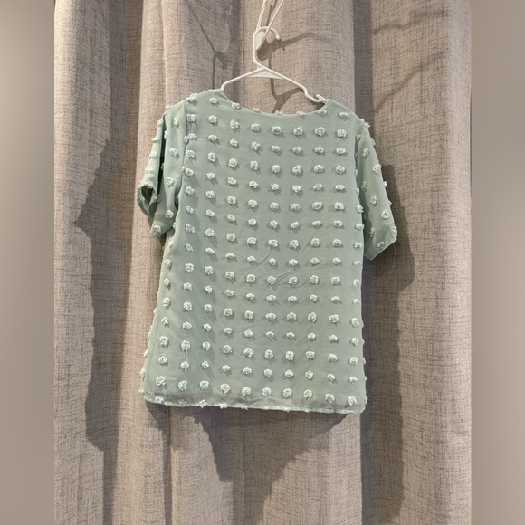 No longer fits, but really cute!! Mint green textured shirt. Size medium - Picture 1 of 3